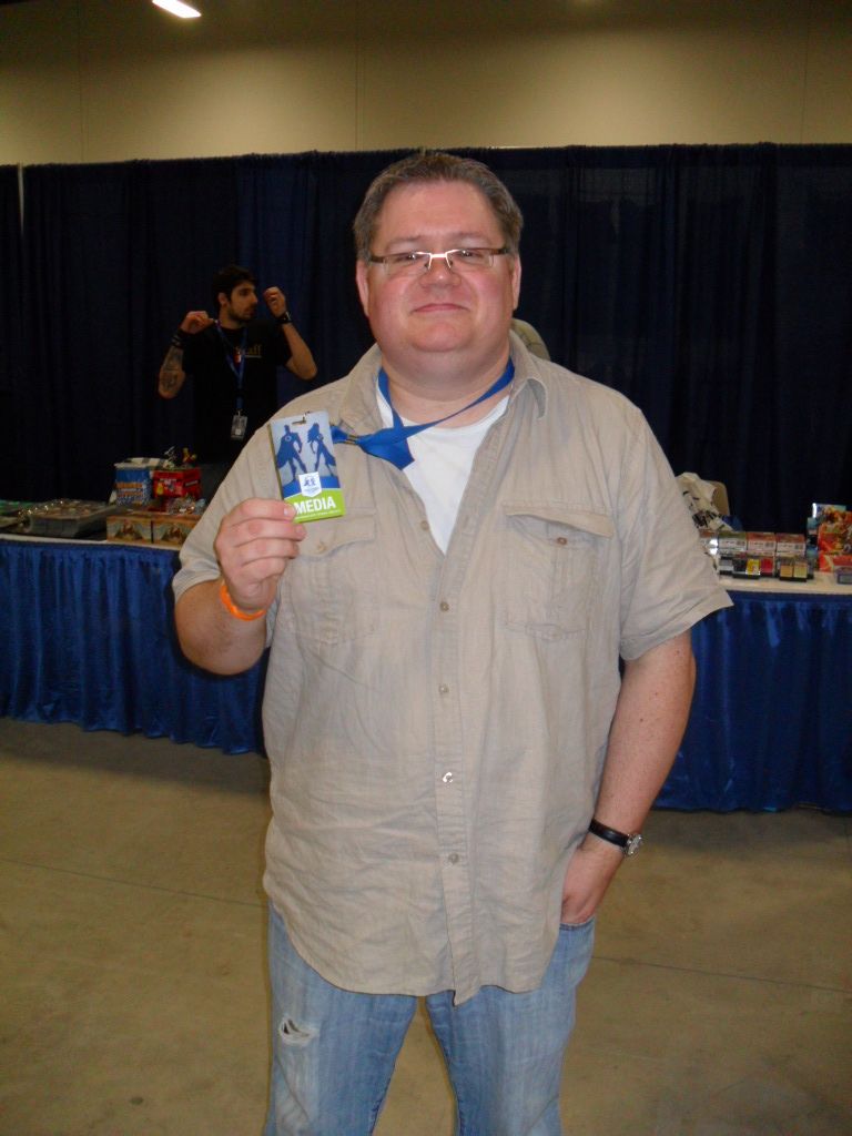 Some guy flashing his Ottawa Comiccon media pass