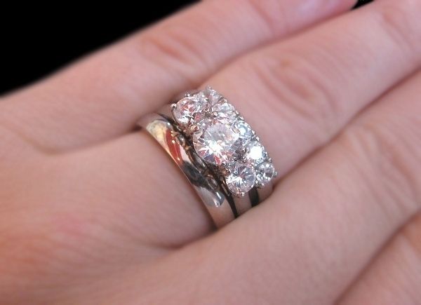 Trilogy ring with wedding band
