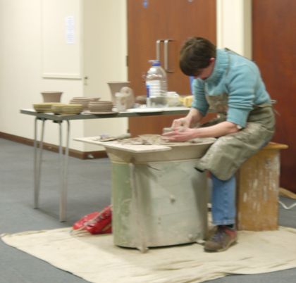 Alison doing a great job of throwing a pot Alison throwing