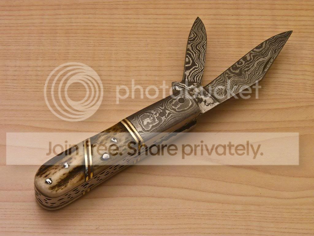custom hand made damascus folding knife ( dual b